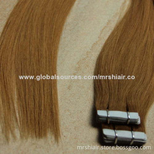 22-inch light brown Peruvian straight tape in hair